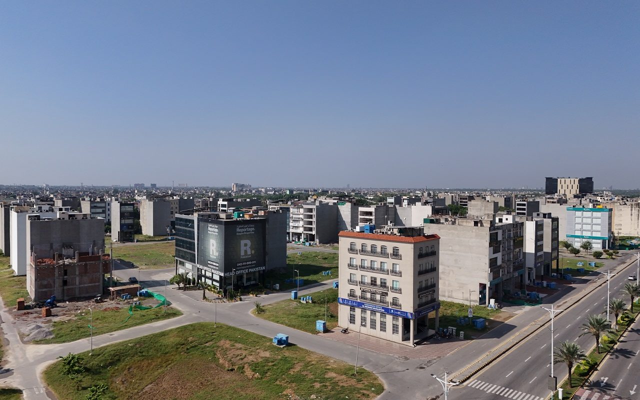 DHA Lahore, Ready-Made House in DHA Lahore, Plot for Sale in DHA Lahore, DHA Lahore Property Investment, House vs Plot, Real Estate Investment Lahore, DHA Lahore Property Guide, Buying Property in Lahore